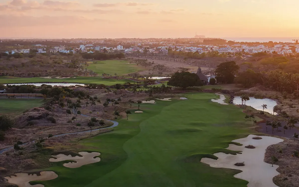 Fairway and bunkers at Mont Choisy Le Golf at sunset